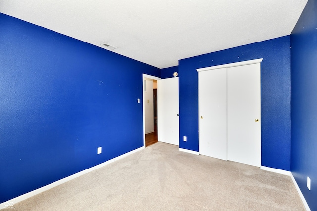 3429 Pavetto Ln, Indianapolis, IN 46203 - unfurnished bedroom featuring carpet and a closet