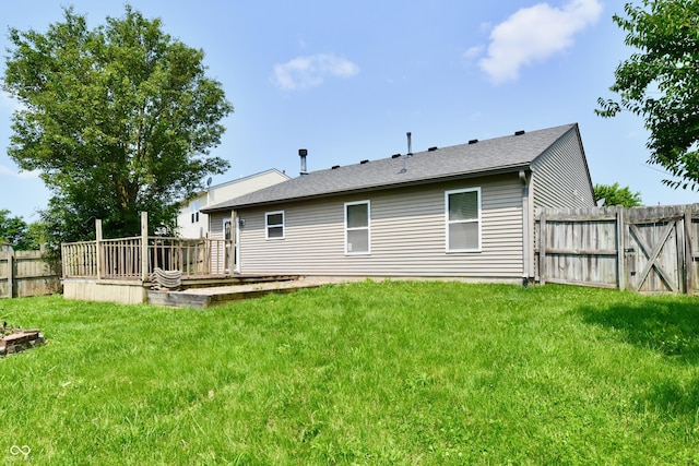 3429 Pavetto Ln, Indianapolis, IN 46203 - rear view of house with a deck and a fenced backyard