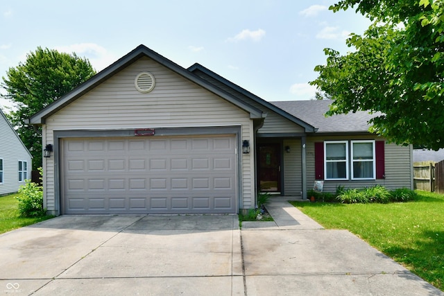 3429 Pavetto Ln, Indianapolis, IN 46203 - ranch-style home with an attached garage, concrete driveway, and roof with shingles