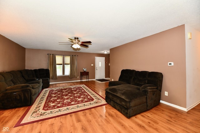 3429 Pavetto Ln, Indianapolis, IN 46203 - living area with wood finished floors and a ceiling fan