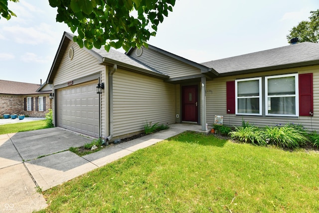 3429 Pavetto Ln, Indianapolis, IN 46203 - single story home with an attached garage, a front yard, and concrete driveway