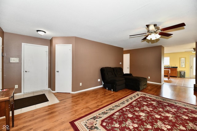 3429 Pavetto Ln, Indianapolis, IN 46203 - living area with ceiling fan and wood finished floors