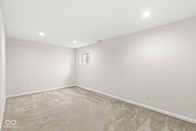 unfurnished room featuring carpet floors, recessed lighting, and baseboards
