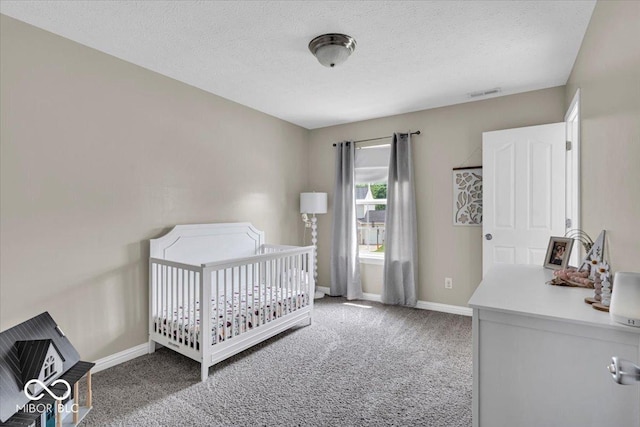 2434 Burgundy Way, Plainfield, IN 46168 - carpeted bedroom with baseboards and a textured ceiling