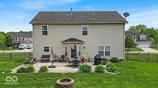2434 Burgundy Way, Plainfield, IN 46168 - rear view of house featuring an outdoor fire pit and a patio