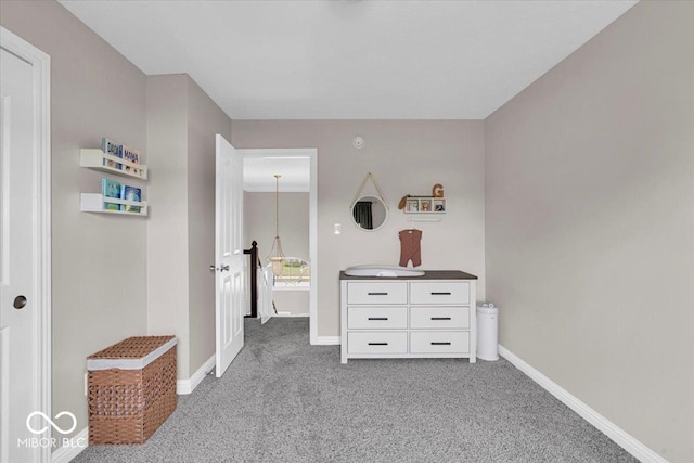 2434 Burgundy Way, Plainfield, IN 46168 - corridor with light colored carpet and baseboards