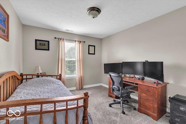 2434 Burgundy Way, Plainfield, IN 46168 - carpeted bedroom featuring a desk, a textured ceiling, and baseboards