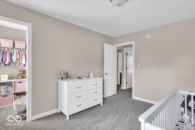 2434 Burgundy Way, Plainfield, IN 46168 - bedroom with light colored carpet, baseboards, and a crib