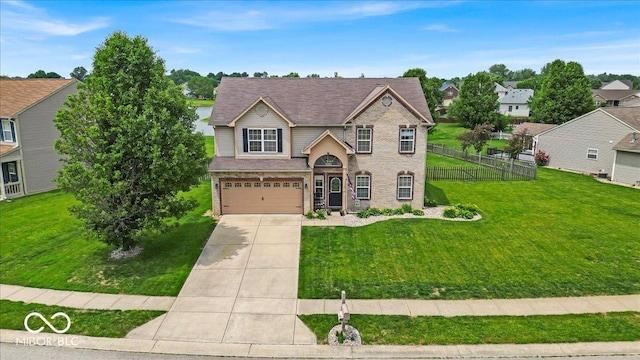 2434 Burgundy Way, Plainfield, IN 46168 - traditional home featuring driveway, an attached garage, and a residential view