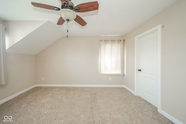 10555 Serra Vista Pt, Fishers, IN 46040 - bonus room with carpet flooring, ceiling fan, baseboards, and lofted ceiling