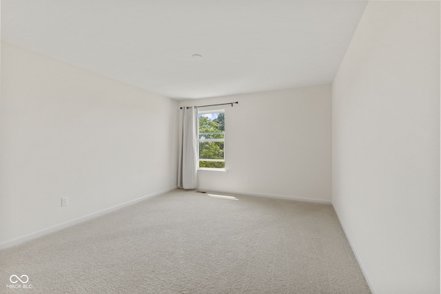 1026 Sorrell Pass, Greenwood, IN 46143 - empty room with light colored carpet and baseboards