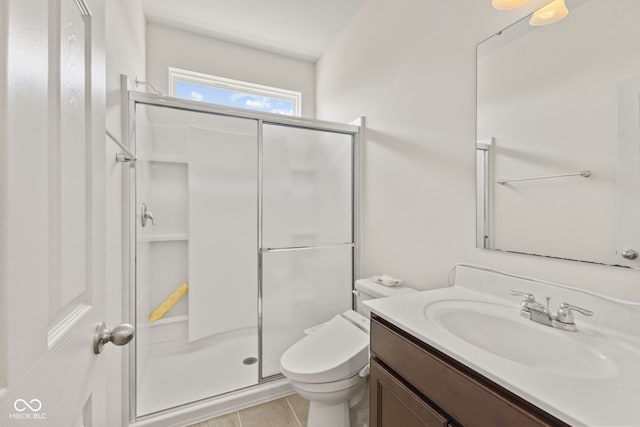 1026 Sorrell Pass, Greenwood, IN 46143 - full bathroom featuring a stall shower, toilet, vanity, and tile patterned floors