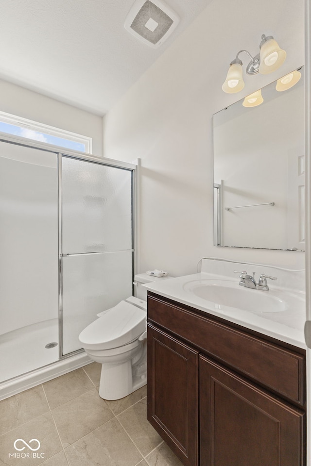 1026 Sorrell Pass, Greenwood, IN 46143 - full bath with vanity, toilet, a stall shower, and tile patterned flooring