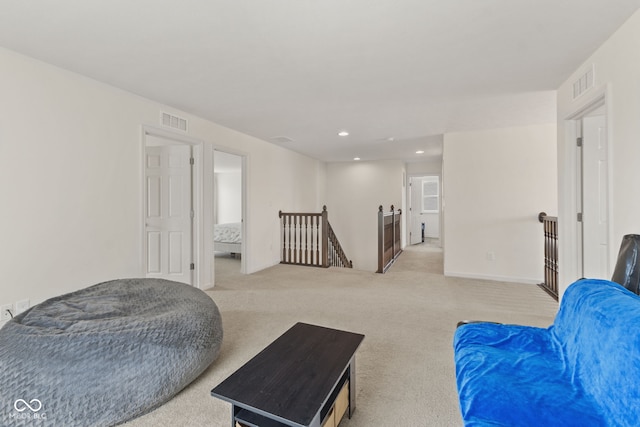1026 Sorrell Pass, Greenwood, IN 46143 - sitting room with an upstairs landing, carpet flooring, recessed lighting, and baseboards