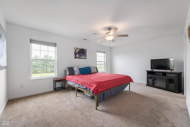 5794 Wintersweet Ln, Whitestown, IN 46075 - bedroom with carpet flooring, baseboards, and ceiling fan