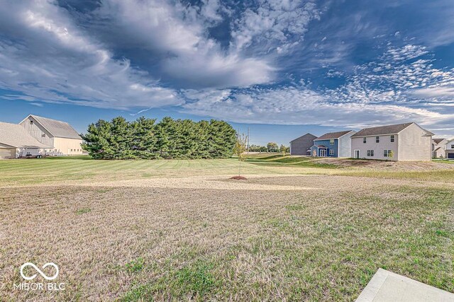 5794 Wintersweet Ln, Whitestown, IN 46075 - view of green lawn with a residential view