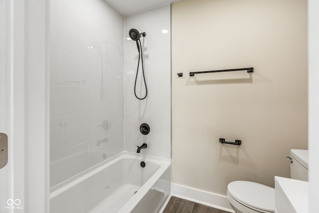 2427 N Rural St, Indianapolis, IN 46218 - full bathroom with toilet, wood finished floors, bathing tub / shower combination, vanity, and baseboards
