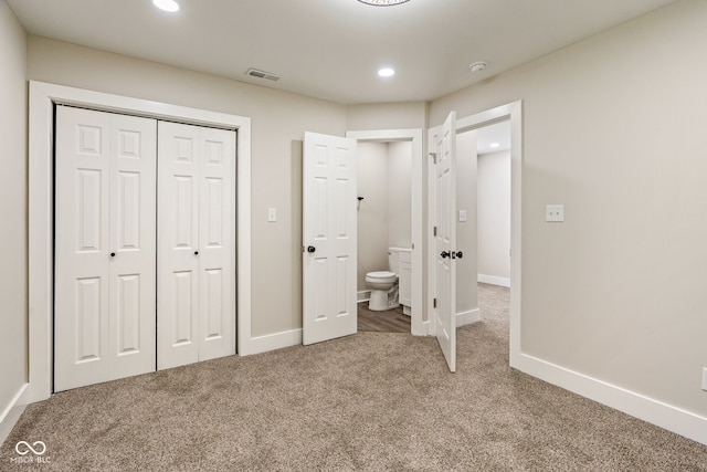 2427 N Rural St, Indianapolis, IN 46218 - unfurnished bedroom with carpet floors, a closet, recessed lighting, and baseboards