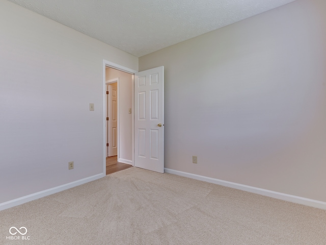 824 Ashton Park Dr, Greenwood, IN 46143 - spare room with carpet and baseboards