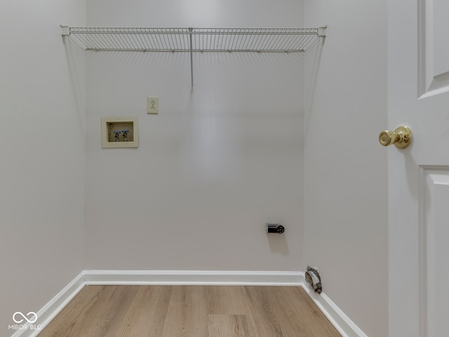 824 Ashton Park Dr, Greenwood, IN 46143 - laundry room featuring light wood-style floors, baseboards, and hookup for a washing machine