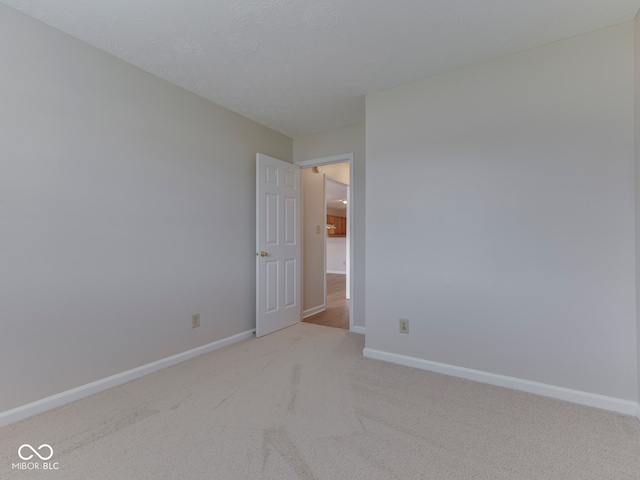 824 Ashton Park Dr, Greenwood, IN 46143 - unfurnished room featuring light colored carpet and baseboards