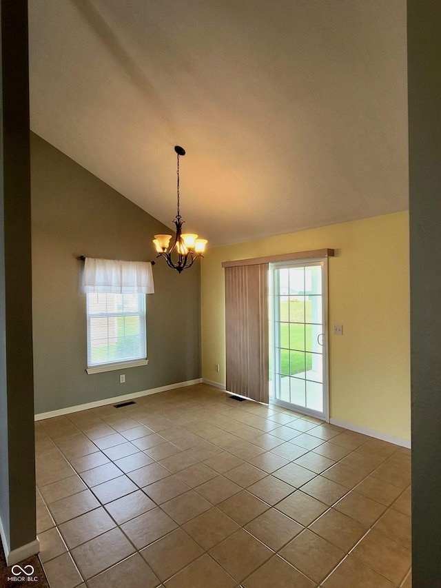 1306 W Daniel Dr, Greensburg, IN 47240 - tiled empty room featuring healthy amount of natural light, lofted ceiling, a chandelier, and baseboards