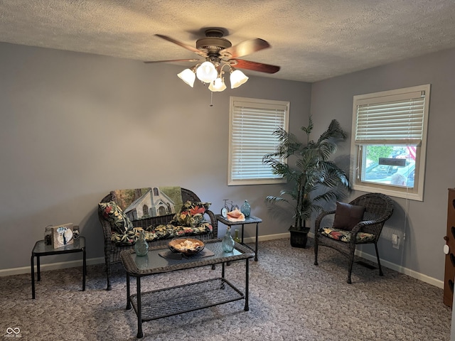 4928 Dancer Dr, Indianapolis, IN 46237 - carpeted living room with a textured ceiling, ceiling fan, and baseboards