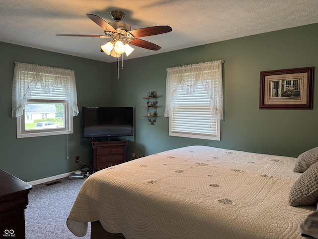 4928 Dancer Dr, Indianapolis, IN 46237 - carpeted bedroom featuring baseboards, ceiling fan, and a textured ceiling