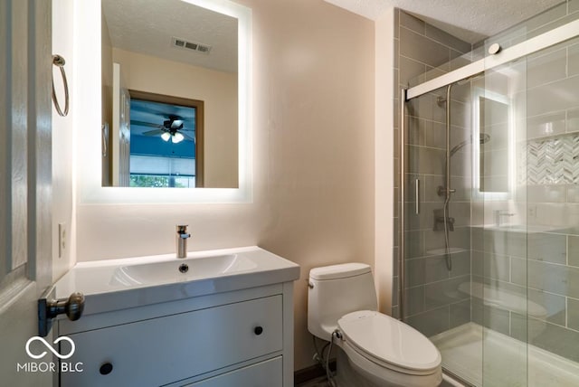 12157 Longstraw Dr, Indianapolis, IN 46236 - full bathroom featuring toilet, a shower stall, vanity, and ceiling fan