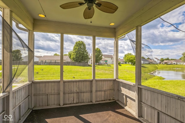 9692 Centennial Ct, Avon, IN 46123 - unfurnished sunroom with ceiling fan, a residential view, and a water view