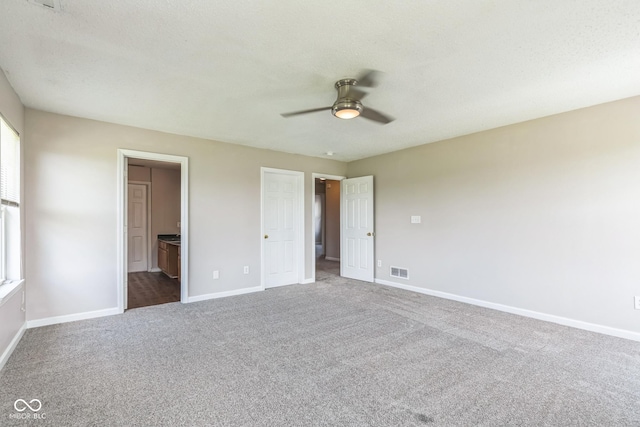 9692 Centennial Ct, Avon, IN 46123 - unfurnished bedroom featuring carpet flooring, baseboards, and connected bathroom