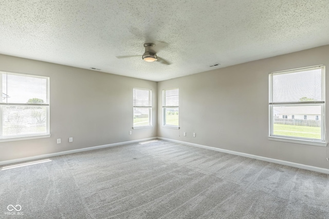 9692 Centennial Ct, Avon, IN 46123 - empty room featuring ceiling fan, carpet, baseboards, and a textured ceiling