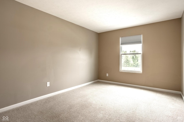 6114 Pebblebrooke Rd, Whitestown, IN 46075 - empty room featuring light colored carpet and baseboards