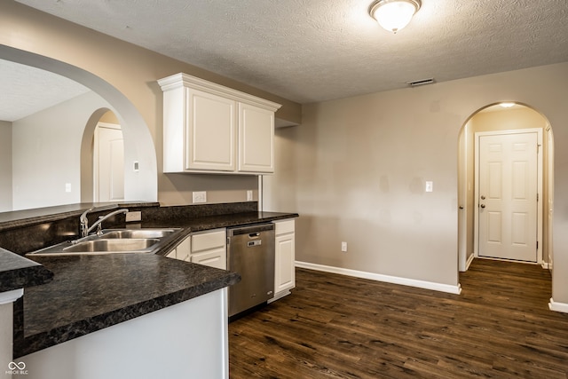 6114 Pebblebrooke Rd, Whitestown, IN 46075 - kitchen featuring dishwasher, a sink, dark wood-type flooring, a peninsula, and white cabinetry
