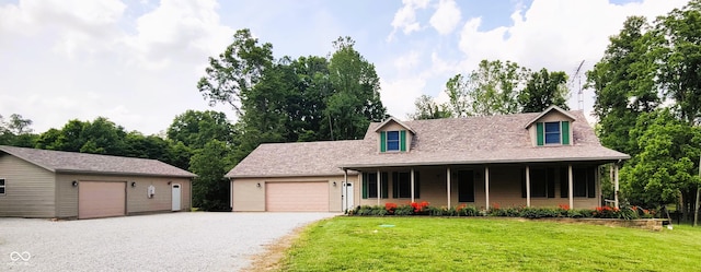 6440 W County Road 1300 S, Westport, IN 47283 - view of front of home with a front lawn, a porch, and a garage