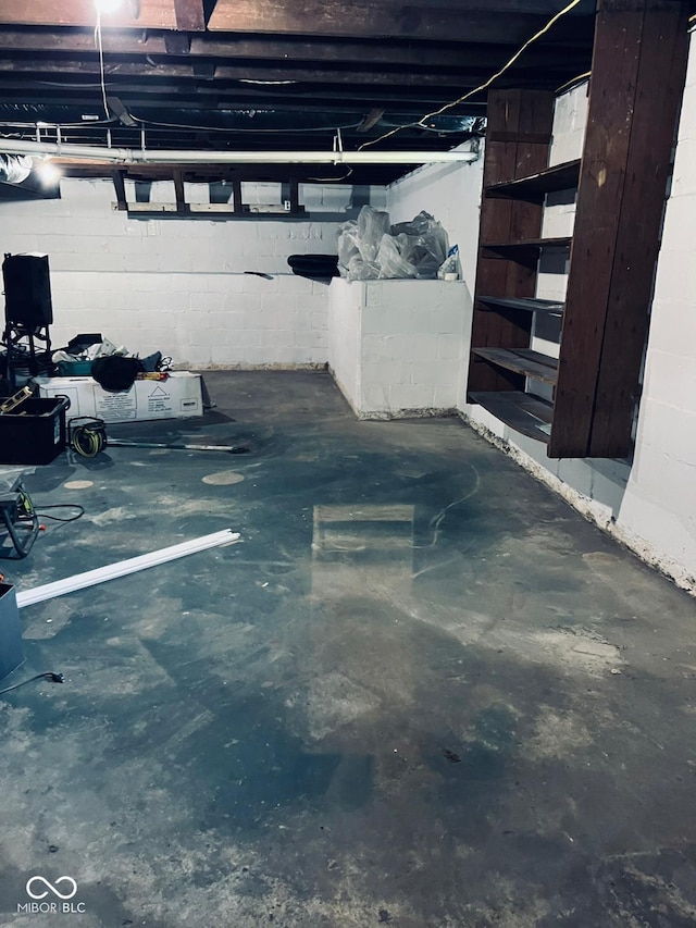 547 N Livingston Ave, Indianapolis, IN 46222 - unfinished basement with concrete block wall
