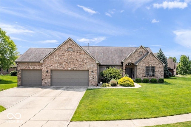 745 Ridge Gate Dr, Brownsburg, IN 46112 - view of front of home featuring a garage, brick siding, driveway, a front lawn, and roof with shingles