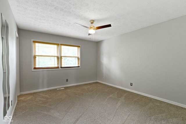 4718 Dancer Dr, Indianapolis, IN 46237 - carpeted empty room featuring a ceiling fan and a textured ceiling