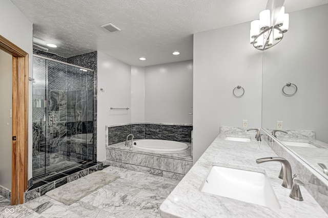 4181 Whitetail Woods Dr, Bargersville, IN 46106 - full bath featuring a garden tub, marble finish flooring, a stall shower, a textured ceiling, and double vanity