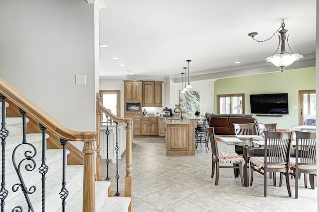 4181 Whitetail Woods Dr, Bargersville, IN 46106 - dining room with light tile patterned floors, ornamental molding, stairway, and recessed lighting