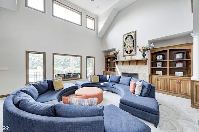 4181 Whitetail Woods Dr, Bargersville, IN 46106 - living room with a high ceiling, a fireplace, healthy amount of natural light, and light colored carpet