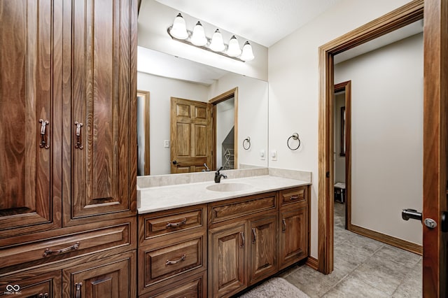 4181 Whitetail Woods Dr, Bargersville, IN 46106 - bathroom with vanity, tile patterned floors, and baseboards