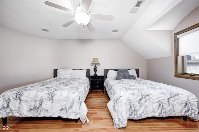 4181 Whitetail Woods Dr, Bargersville, IN 46106 - bedroom with wood finished floors, ceiling fan, and vaulted ceiling