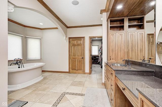 4181 Whitetail Woods Dr, Bargersville, IN 46106 - full bath featuring crown molding, vanity, a freestanding tub, tile patterned flooring, and baseboards