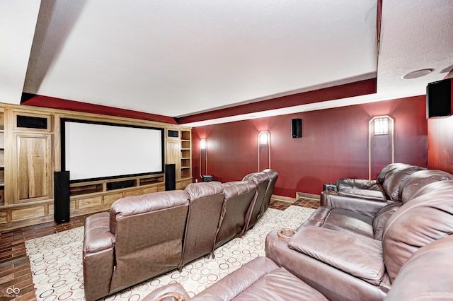 4181 Whitetail Woods Dr, Bargersville, IN 46106 - home theater room featuring built in shelves, baseboards, and a tray ceiling