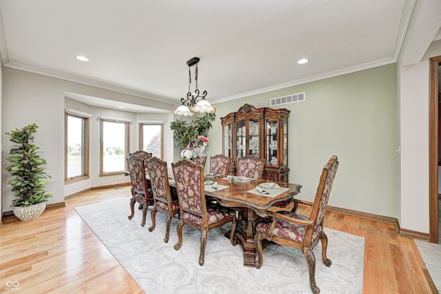 4181 Whitetail Woods Dr, Bargersville, IN 46106 - dining area with baseboards, light wood-style flooring, crown molding, and recessed lighting