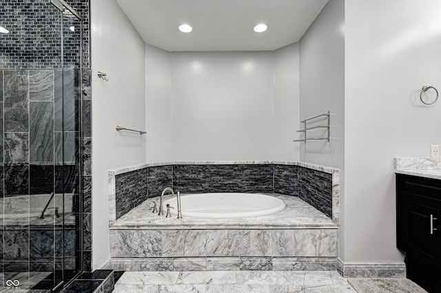 4181 Whitetail Woods Dr, Bargersville, IN 46106 - full bath featuring a garden tub, vanity, a stall shower, marble finish floors, and baseboards