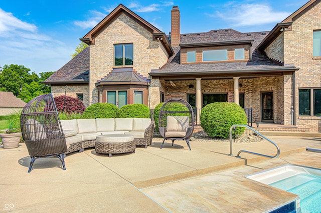 4181 Whitetail Woods Dr, Bargersville, IN 46106 - rear view of property featuring a chimney, a patio, an outdoor living space, and brick siding