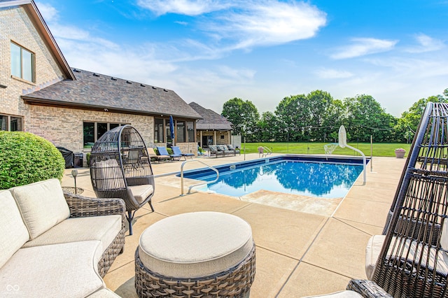4181 Whitetail Woods Dr, Bargersville, IN 46106 - view of swimming pool featuring a patio area, an outdoor living space, and a lawn
