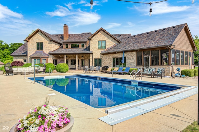 4181 Whitetail Woods Dr, Bargersville, IN 46106 - outdoor pool featuring a sunroom and a patio